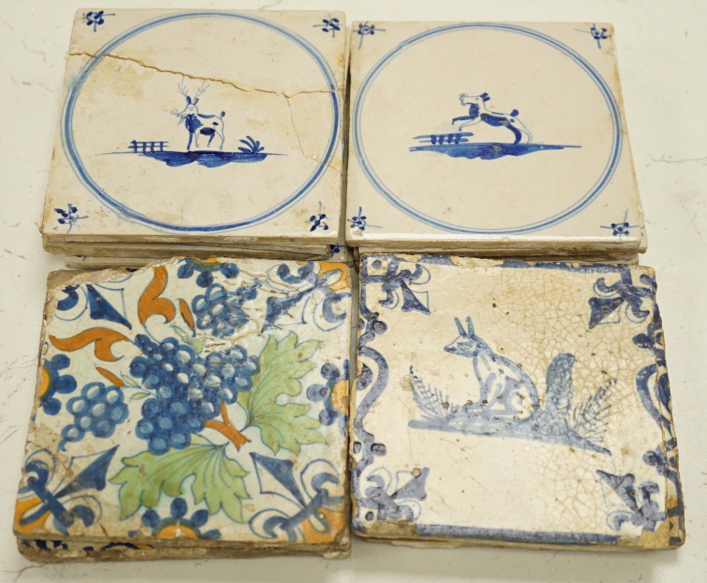 Four 18th century Delft tiles and nine 19th-century Delft blue and white animal tiles(13)